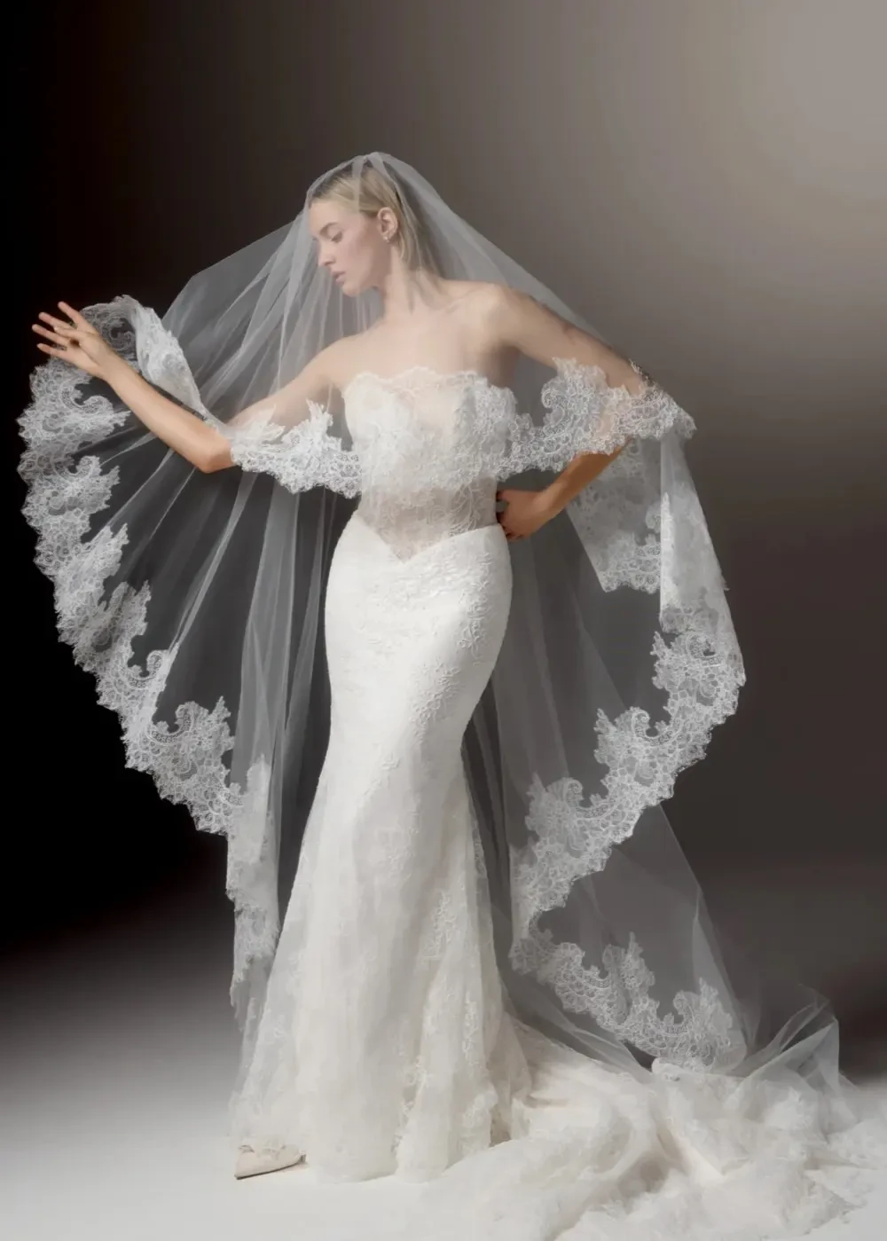 Model wearing a dress by Justin Alexander Signature