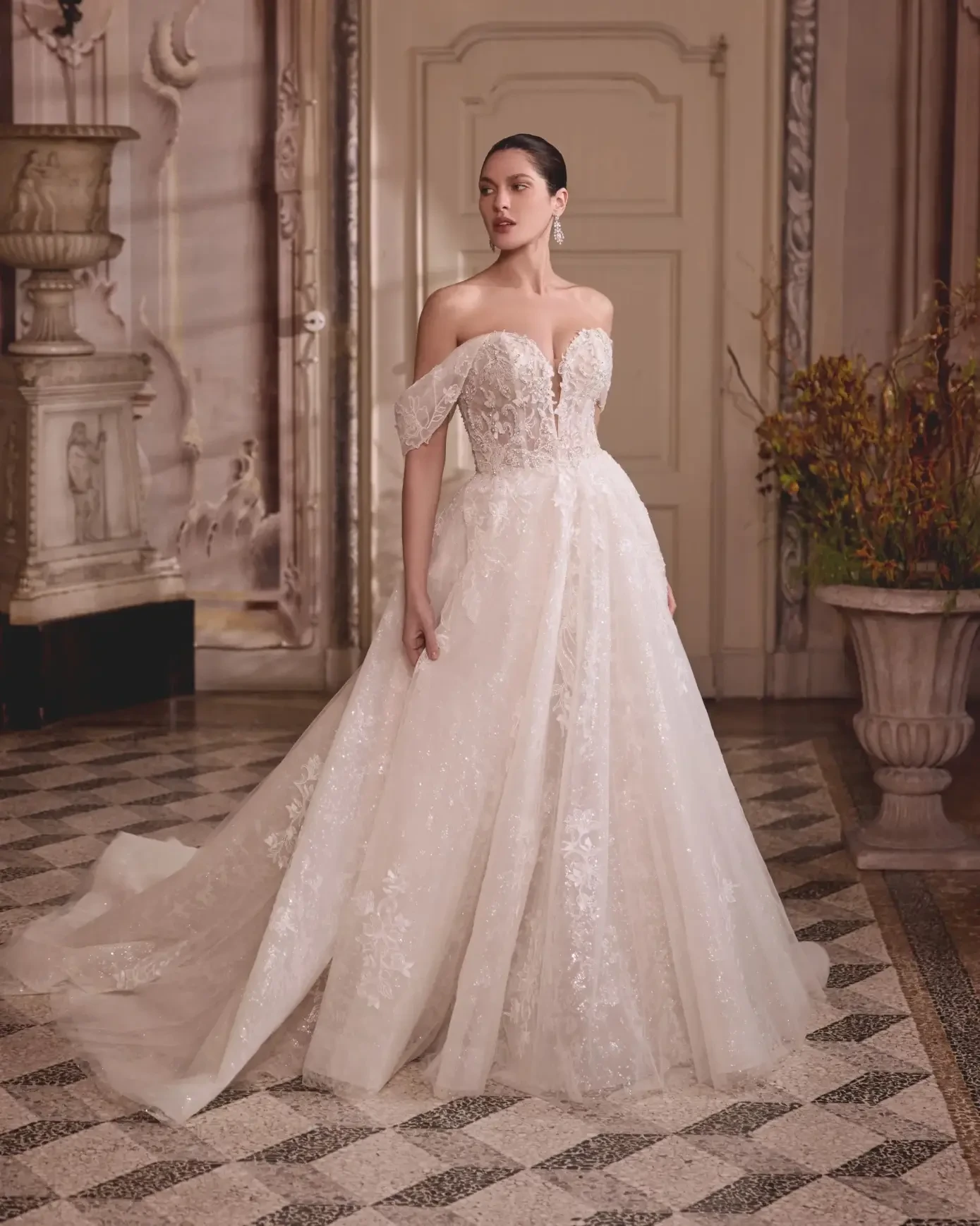 Model wearing a dress by Justin Alexander