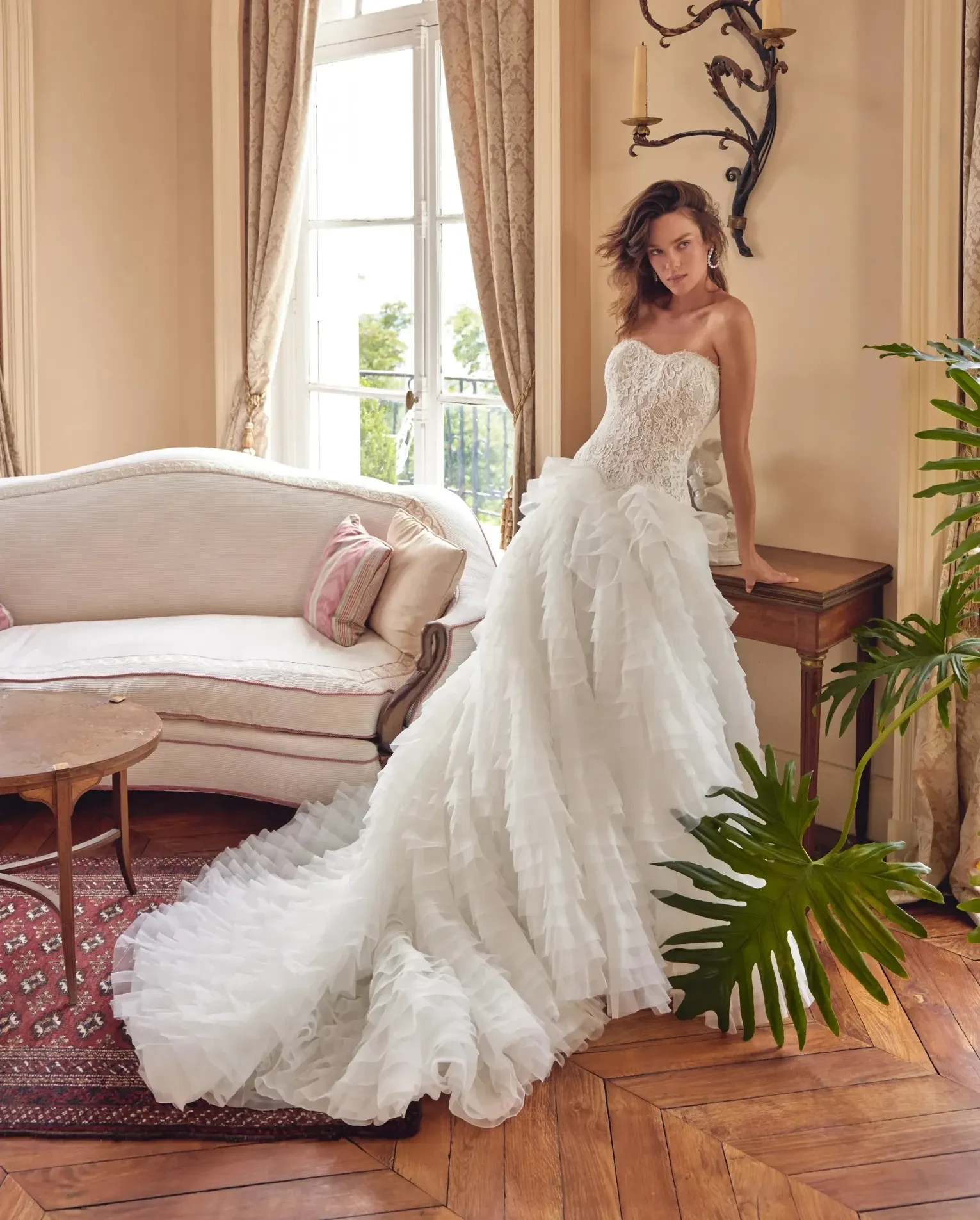 Model wearing a dress by Justin Alexander