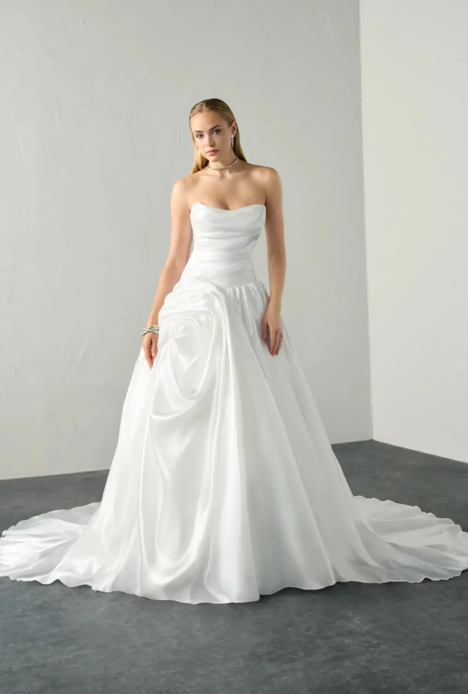 Model wearing a dress by Justin Alexander Signature