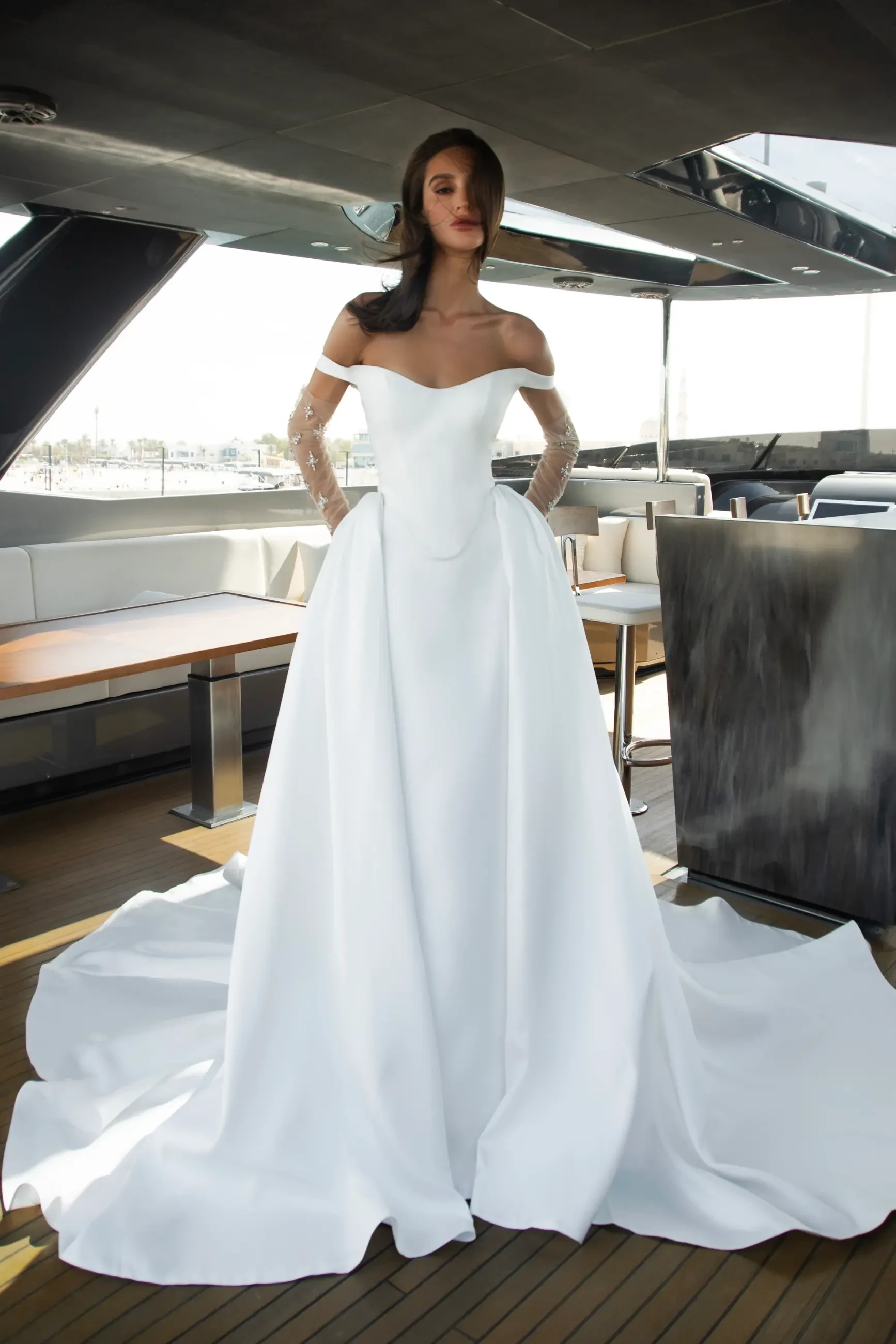 Model wearing a dress by the Amber Collection