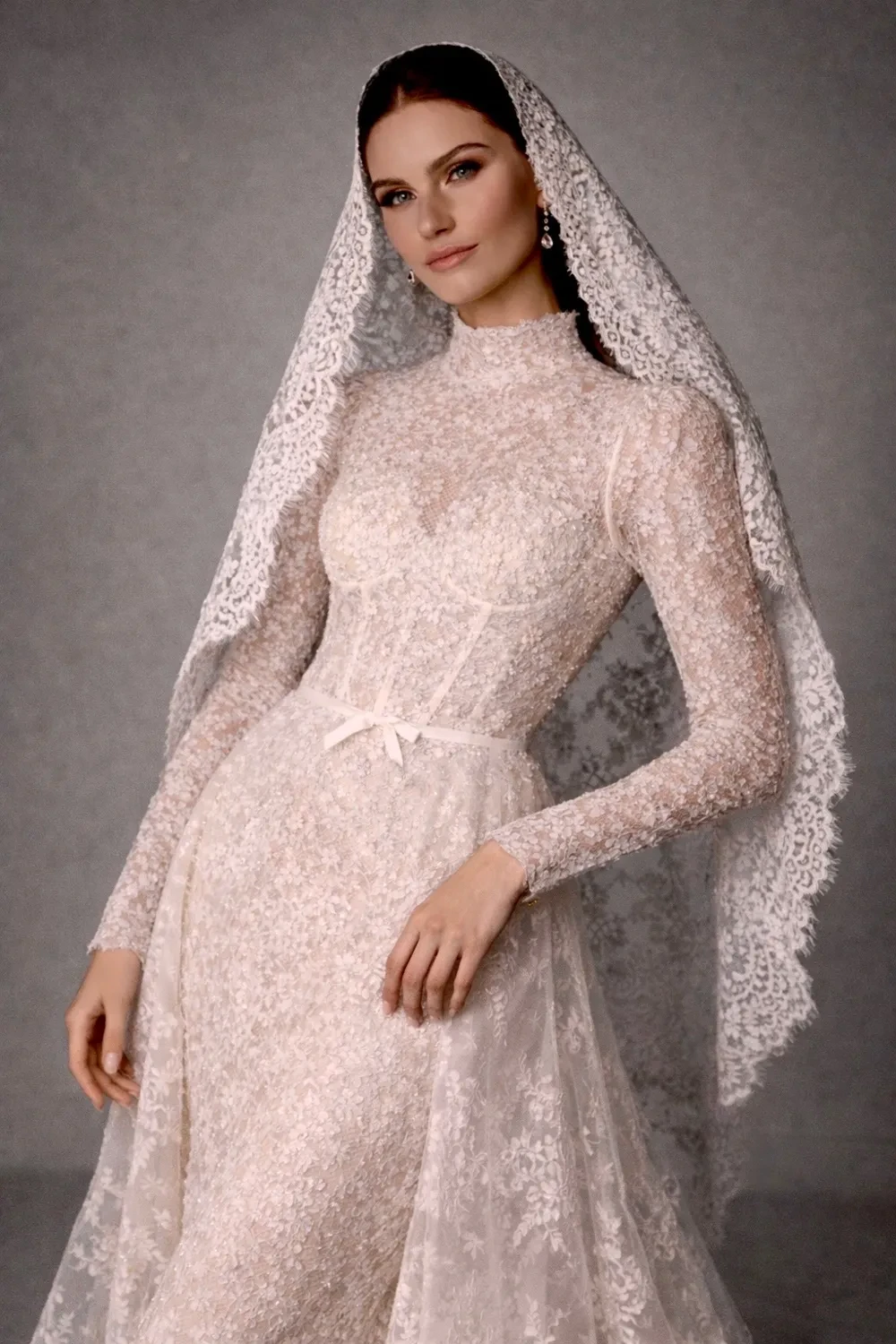 Model wearing a dress by Autumn Silk Couture
