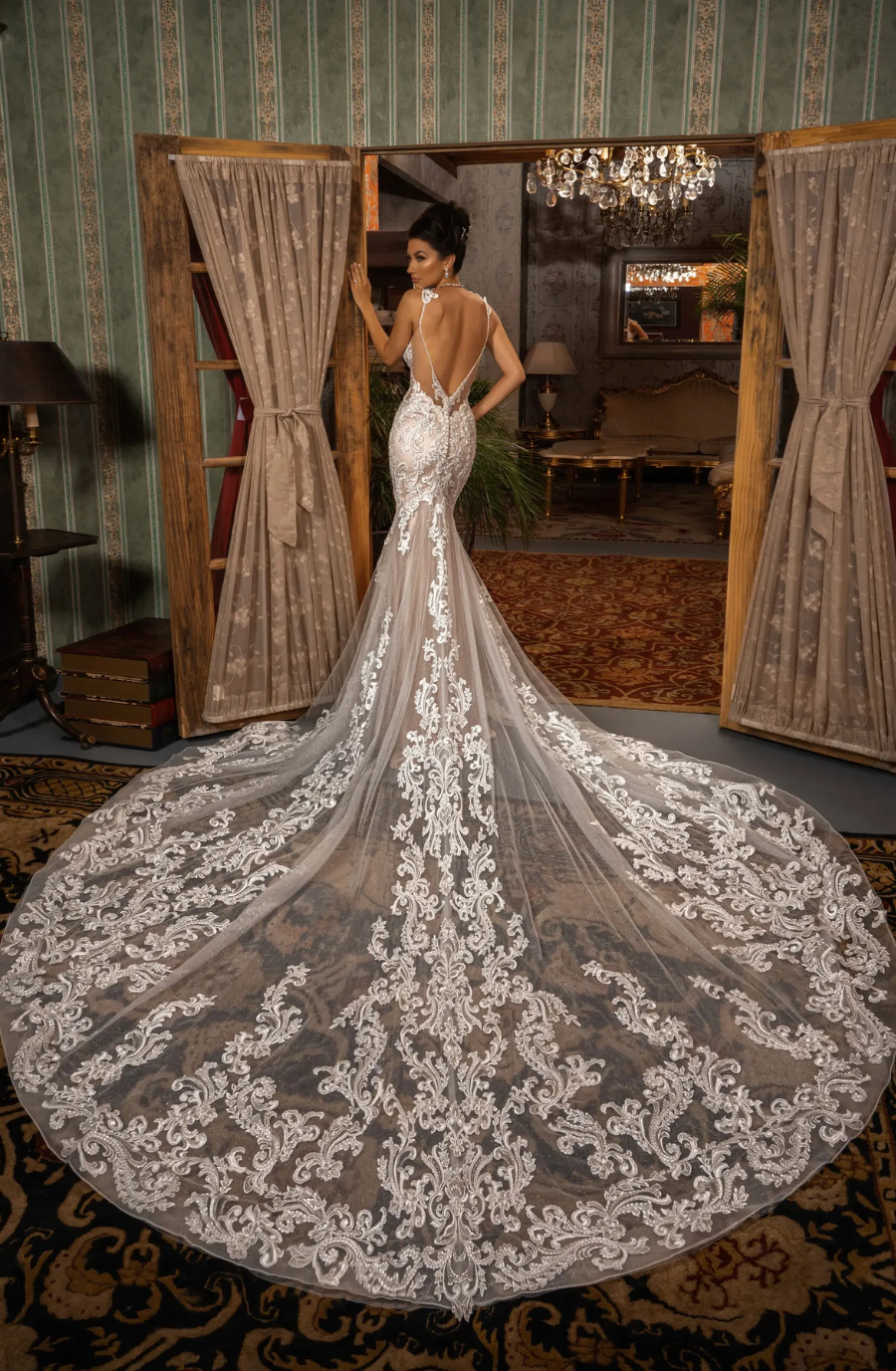 model is wearing an off the shoulder bridal gown